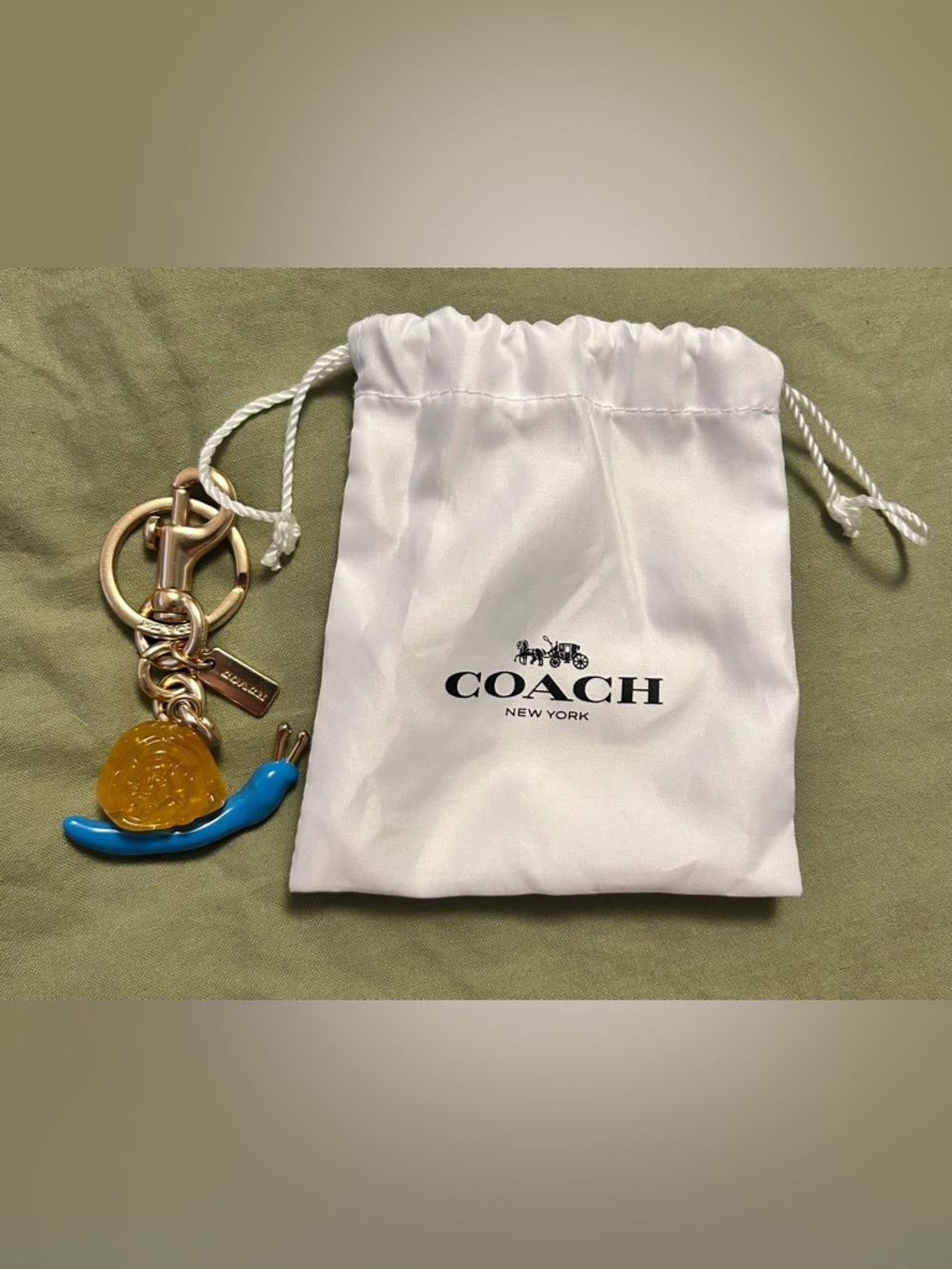 Coach Blue & glittery Amber Snail Key Charm with Gold Hardware